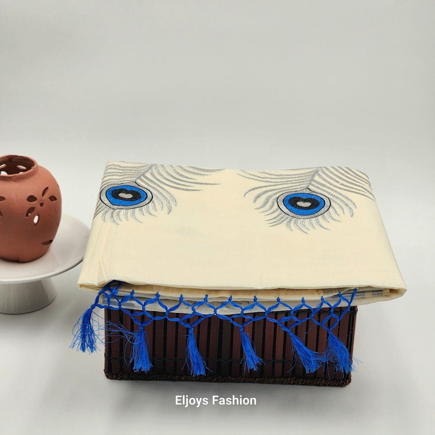 Tissue Silk saree with covert design and Silver borders in stunning silver ,Blue and black color combination