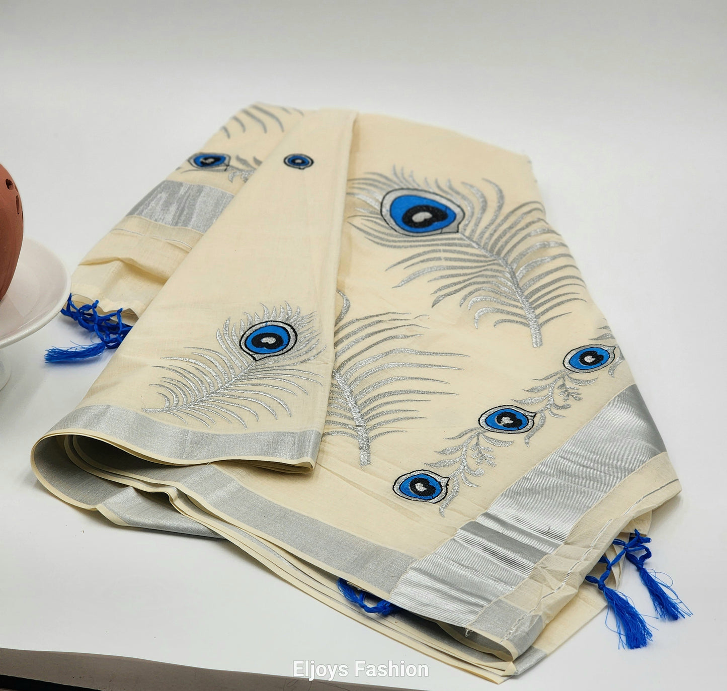Tissue Silk saree with covert design and Silver borders in stunning silver ,Blue and black color combination