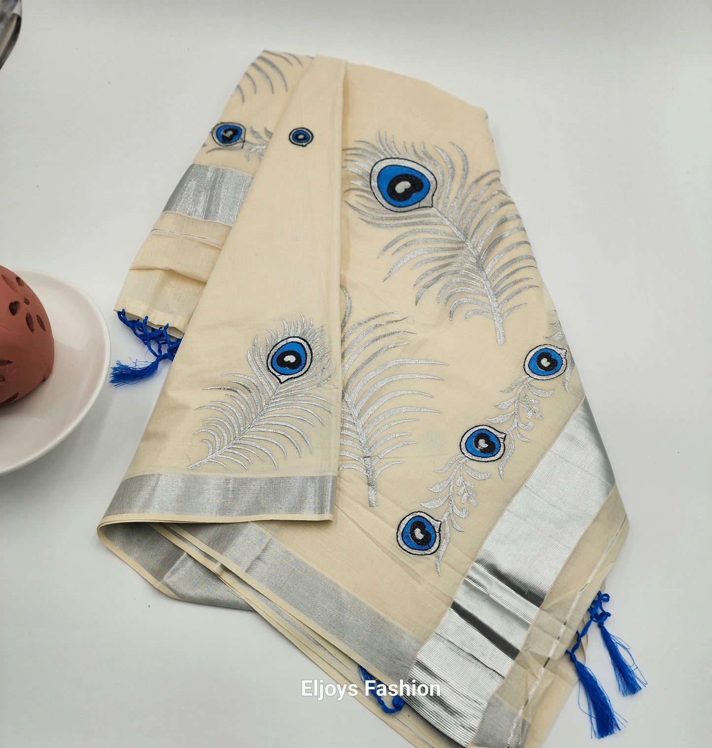 Tissue Silk saree with covert design and Silver borders in stunning silver ,Blue and black color combination
