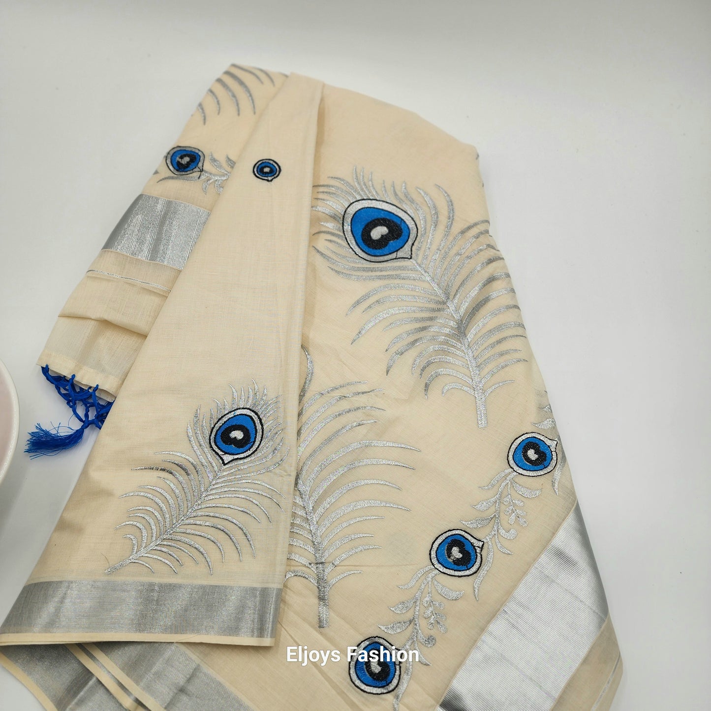 Tissue Silk saree with covert design and Silver borders in stunning silver ,Blue and black color combination