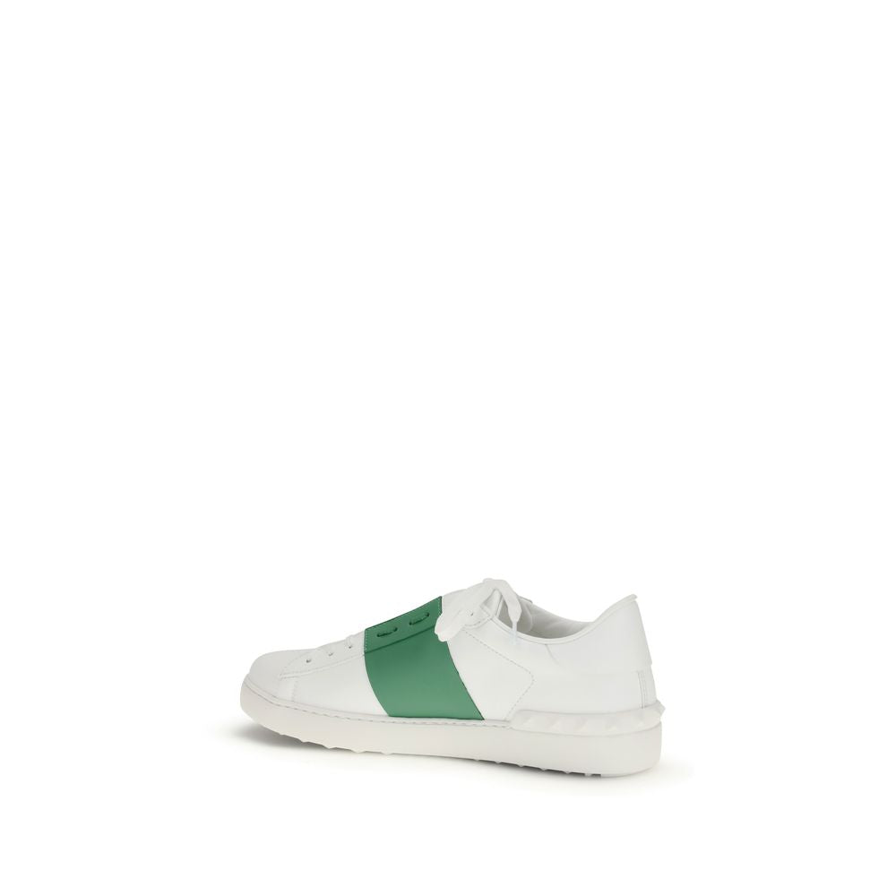 Valentino Garavani white calf leather Bos Taurus low top sneakers showing sleek design and smooth leather finish.