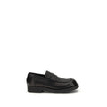 MM6 black calf leather Bos Taurus slip-on loafers showing sleek design and smooth leather finish.