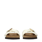 Valentino Garavani beige leather slippers with a soft, comfortable design and subtle branding, ideal for casual or stylish wear.