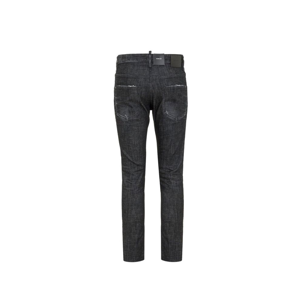 Black cotton skinny jeans by Dsquared² with a fitted style and classic five-pocket design, shown on a model.