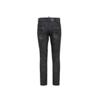 Black cotton skinny jeans by Dsquared² with a fitted style and classic five-pocket design, shown on a model.