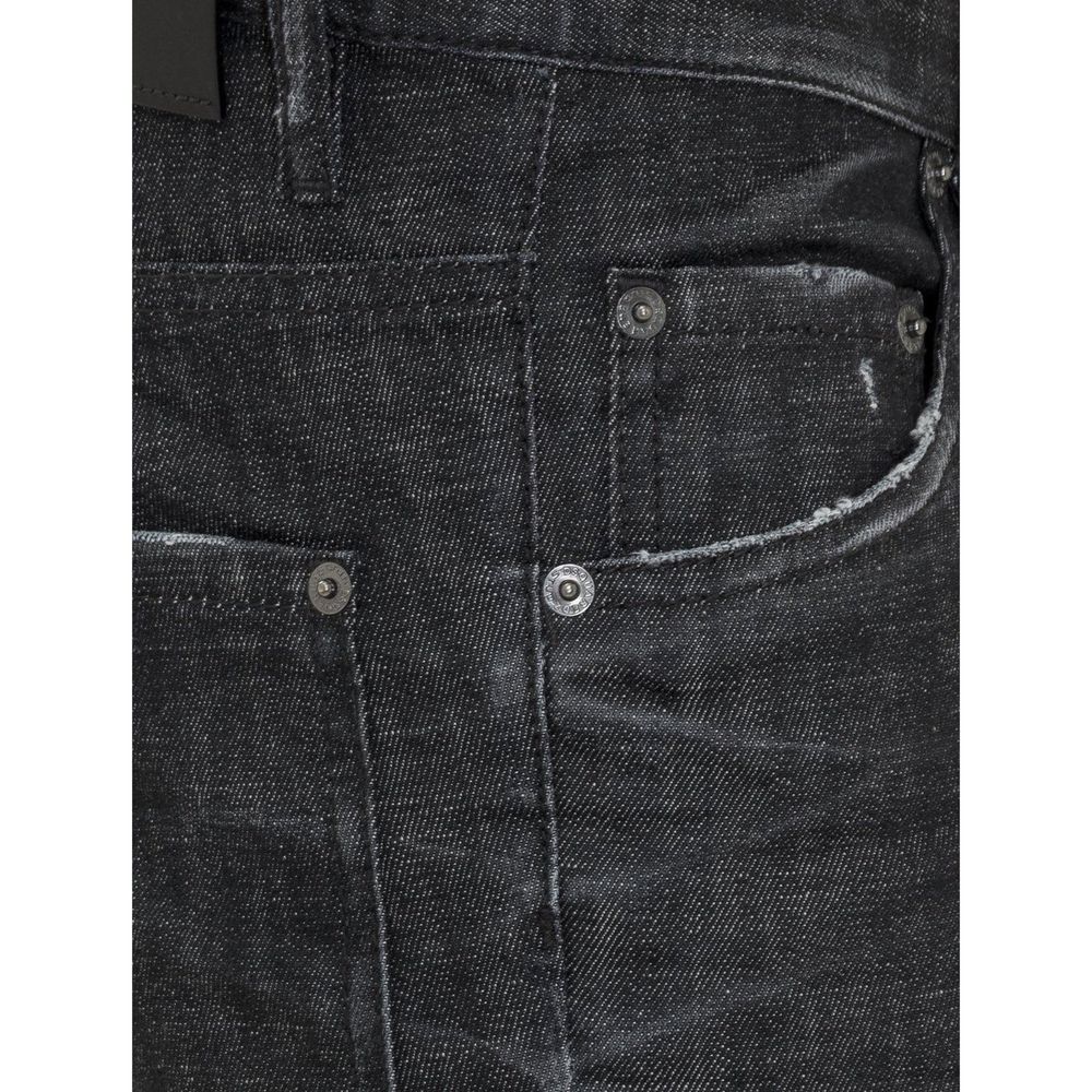 Black cotton skinny jeans by Dsquared², showing a close-up of the fitted waist and sleek denim fabric.