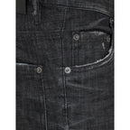 Black cotton skinny jeans by Dsquared², showing a close-up of the fitted waist and sleek denim fabric.