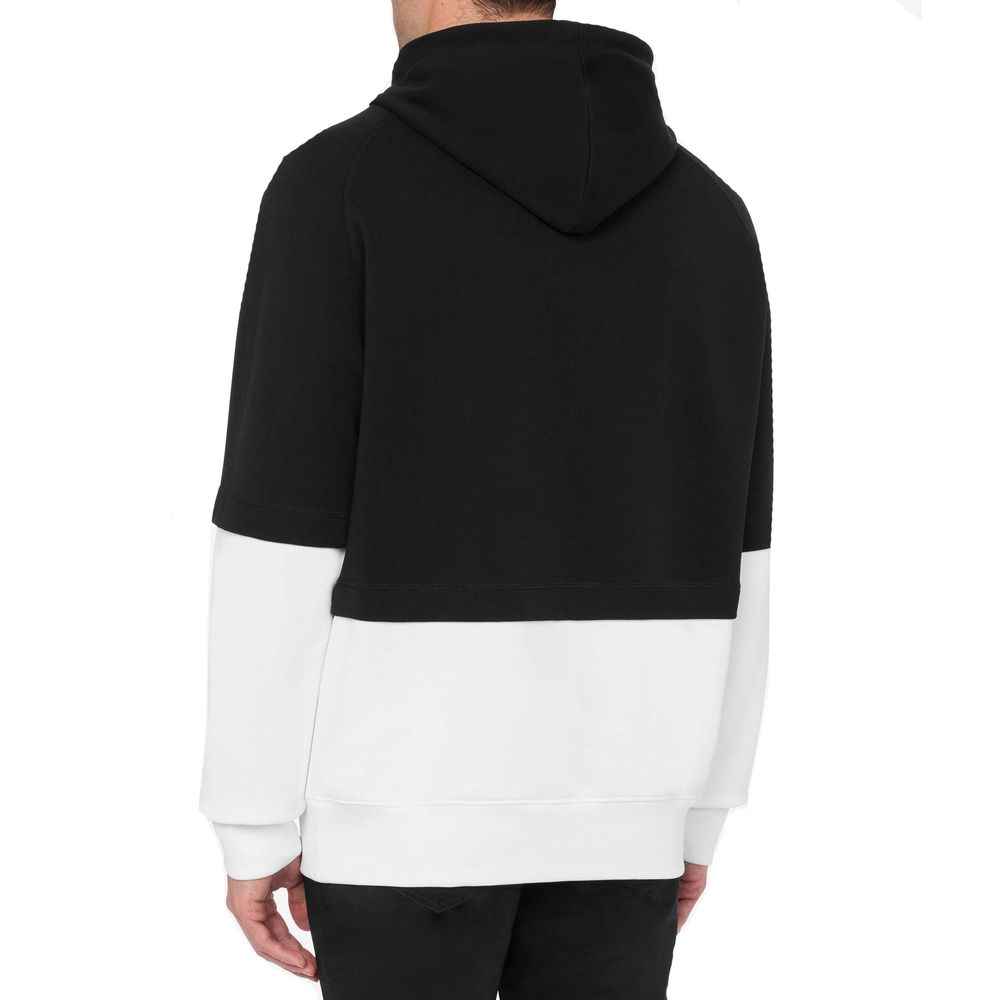 Black Moschino cotton sweatshirt with logo detail, casual fit, and ribbed cuffs, displayed on a neutral background.