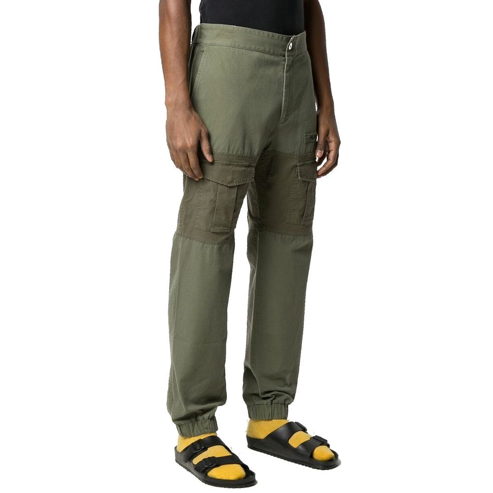 Palm Angels bicolor cotton cargo pants with multiple pockets, relaxed fit, and adjustable waistband, shown on a model.