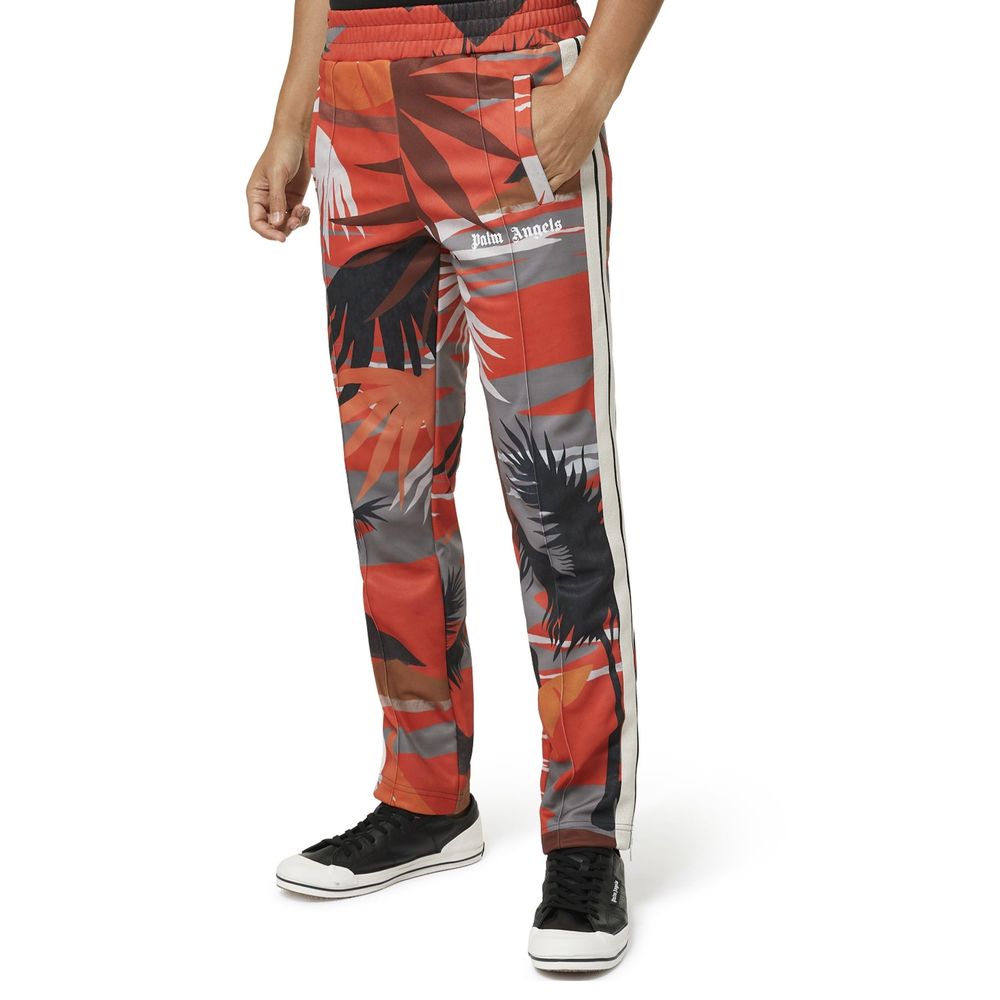 Palm Angels red polyester athletic pants with a relaxed fit, featuring the brand's logo and modern sporty design.