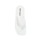 White Rubber Slides by Palm Angels featuring a sleek design and open-toe style, perfect for casual summer wear.