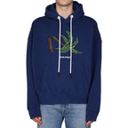 Palm Angels blue cotton sweatshirt with a relaxed fit, featuring the brand's logo on the front, displayed on a hanger.