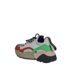 White vegan leather chunky sneakers by Stella McCartney with a modern, stylish design and thick sole for a trendy look.