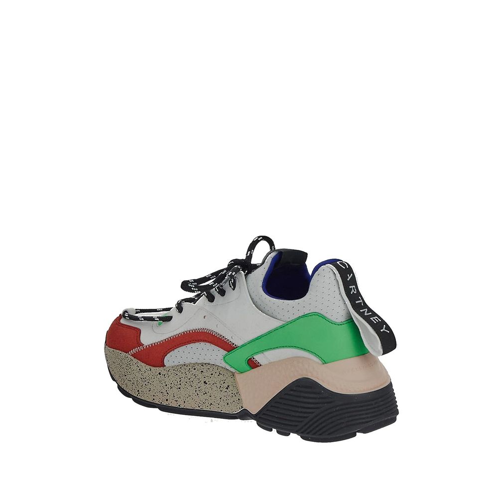 White vegan leather chunky sneakers by Stella McCartney with a modern, stylish design and thick sole for a trendy look.
