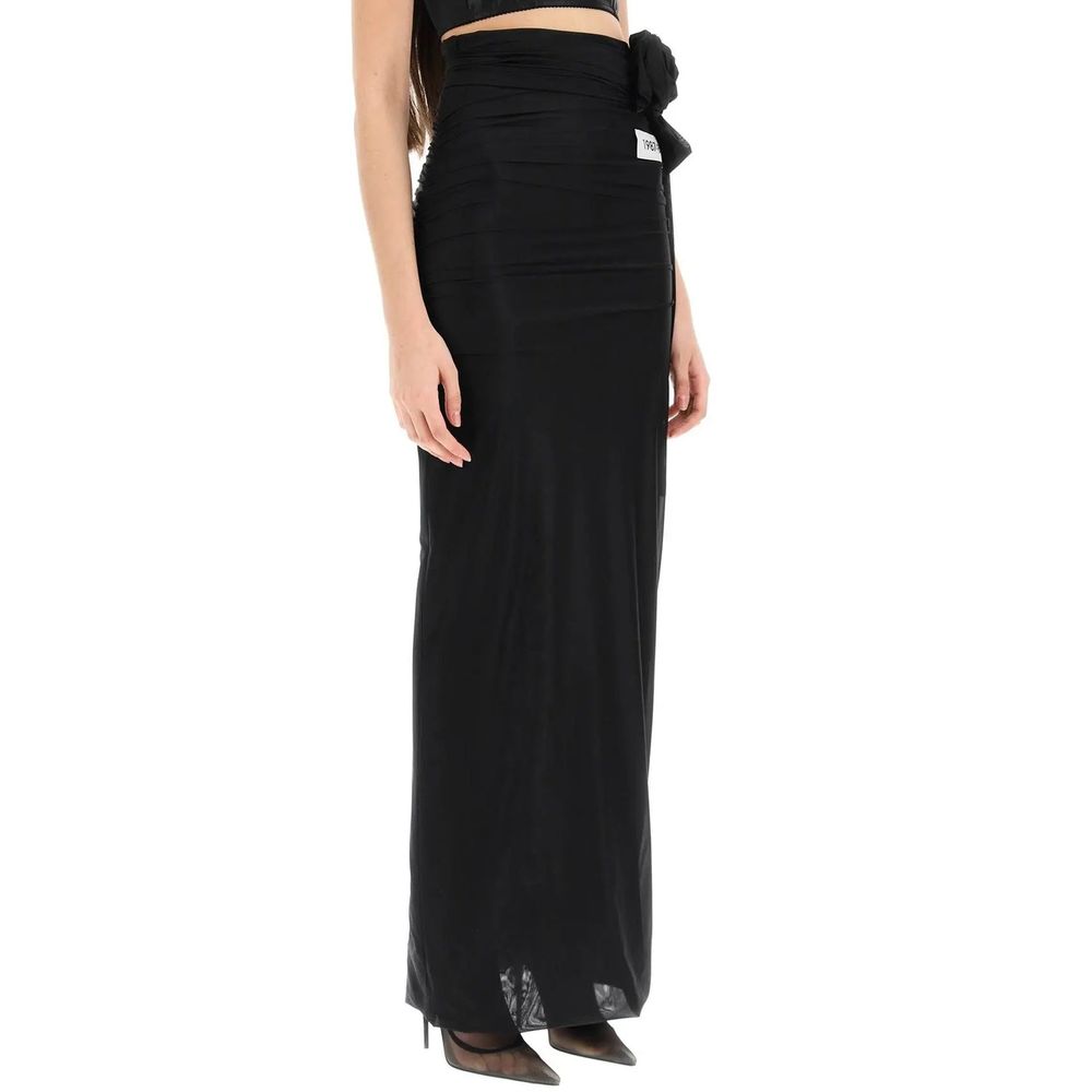 Dolce & Gabbana black elastane long skirt displayed on a mannequin, featuring a sleek, fitted design with a high waist.