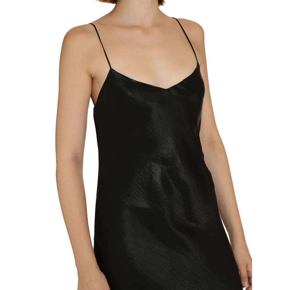 Saint Laurent black acetate casual dress displayed on a hanger, featuring sleek design and minimalist style.
