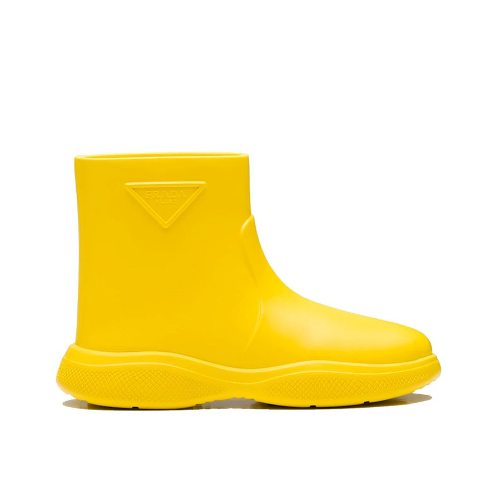 Prada multicolor rubber rain boots with vibrant striped design and sturdy soles, perfect for wet weather.