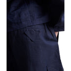 Prada blue linen Bermuda shorts with a relaxed fit, featuring a tailored waistband and classic design, perfect for casual wear.