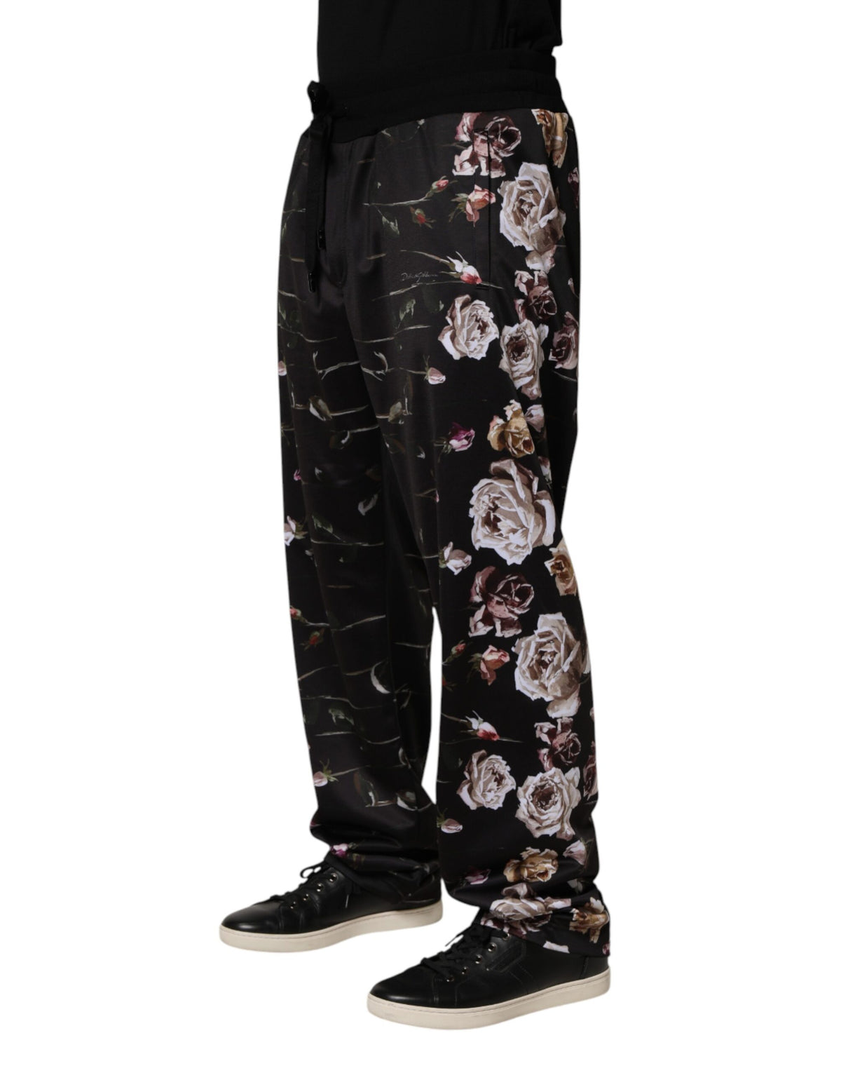 Black floral straight-leg chino trousers by Dolce & Gabbana, featuring a tailored fit and floral pattern detail.