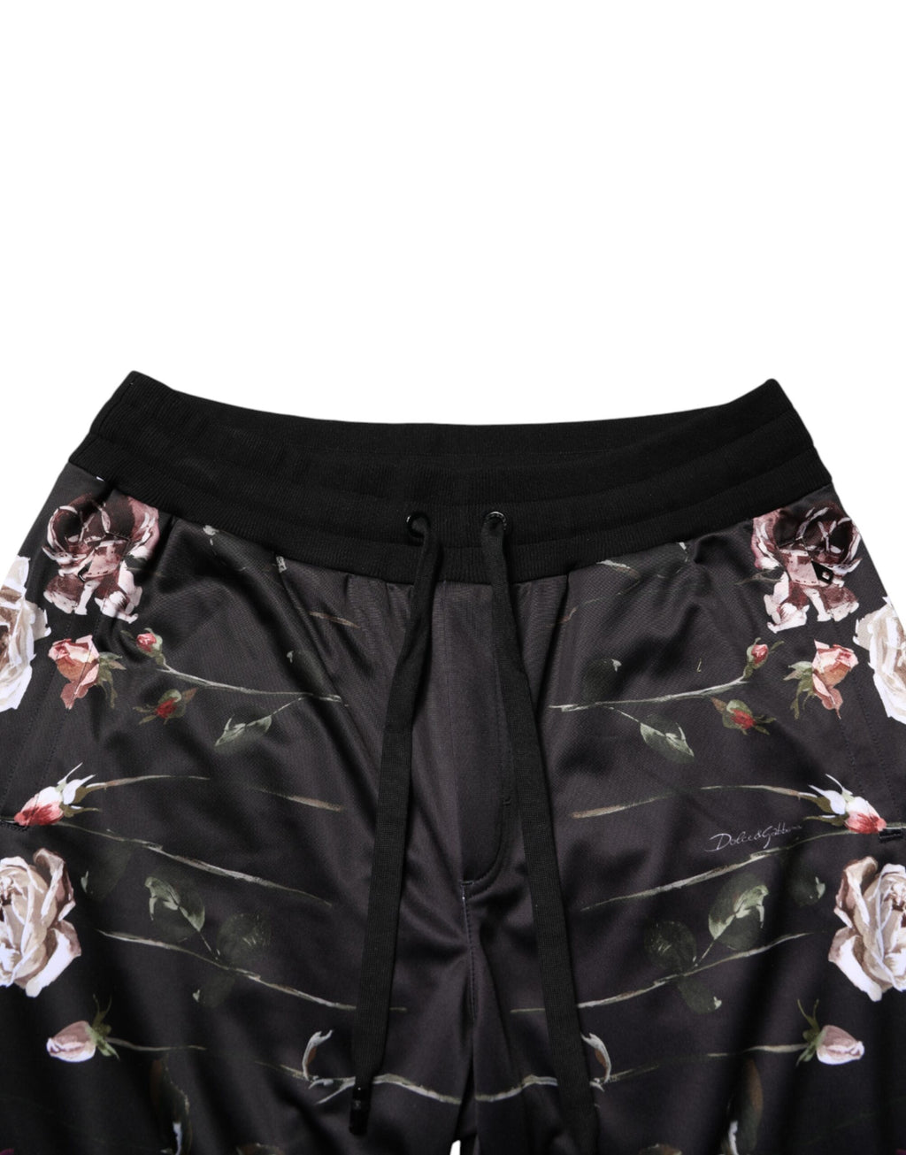 Black floral straight-leg chino trousers by Dolce & Gabbana, featuring a tailored fit and floral pattern design.