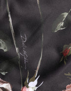 Black floral straight-leg chino trouser pants by Dolce & Gabbana, featuring a tailored fit and floral pattern detail.