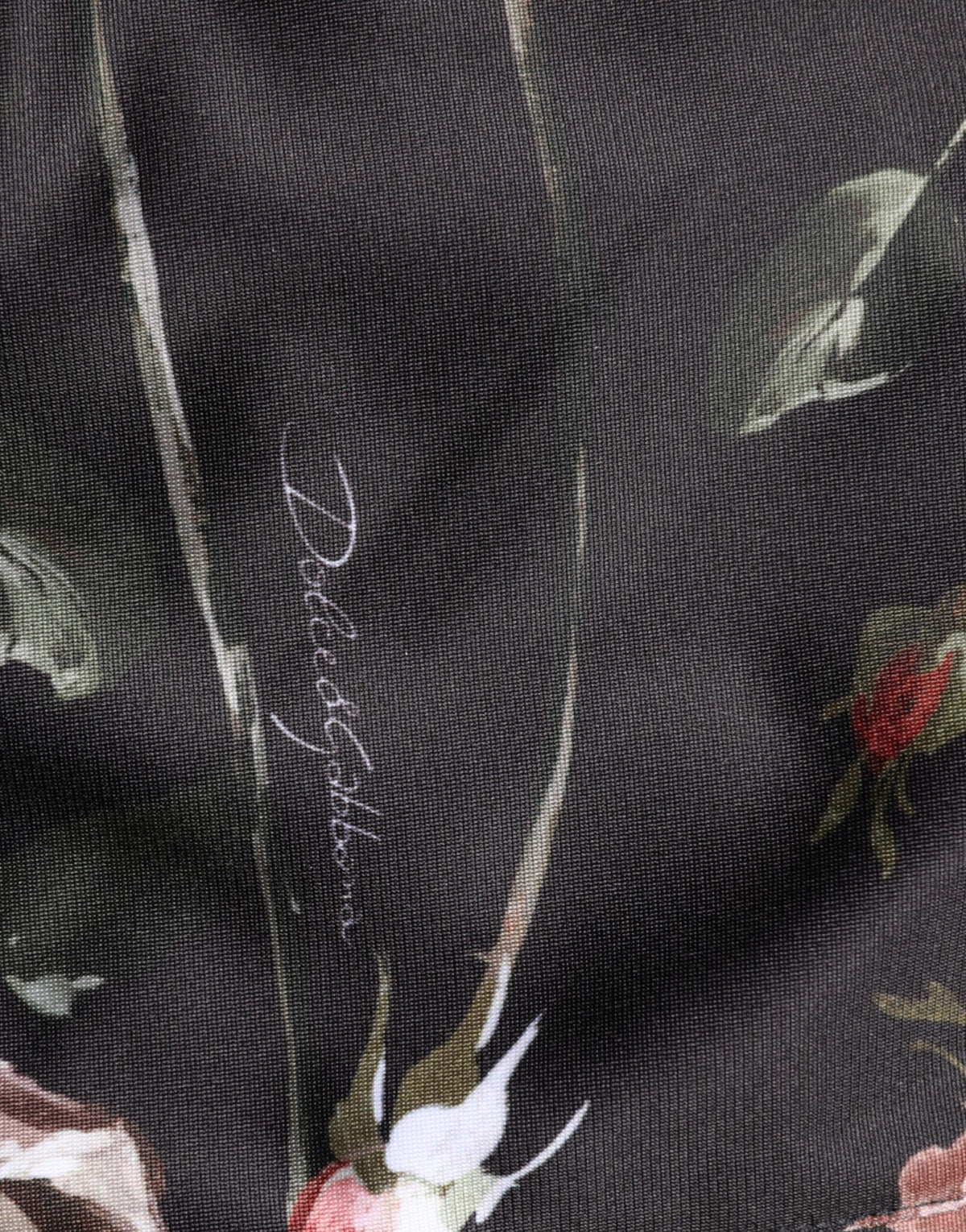 Black floral straight-leg chino trouser pants by Dolce & Gabbana, featuring a tailored fit and floral pattern detail.