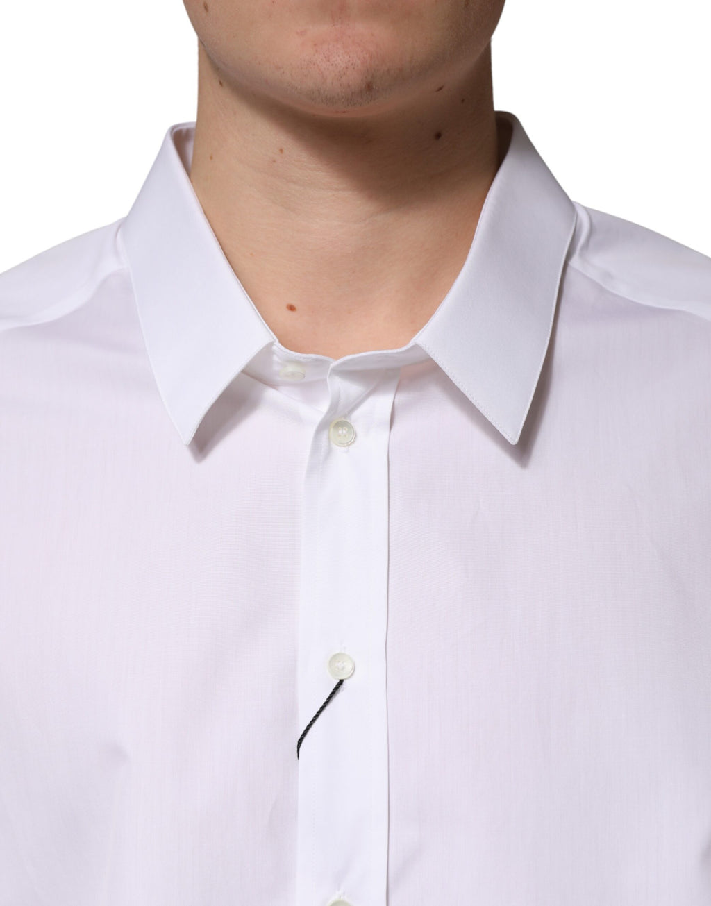 Dolce & Gabbana white Sartoria cotton dress shirt with a classic collar, neatly folded, ready for formal wear.