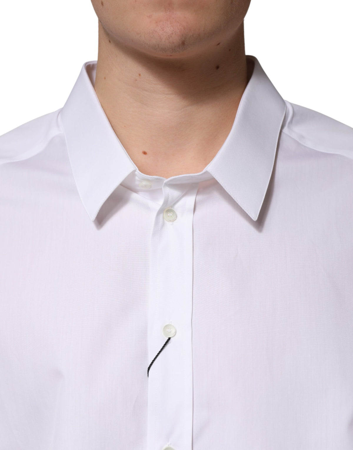Dolce & Gabbana white Sartoria cotton dress shirt with a classic collar, neatly folded, ready for formal wear.