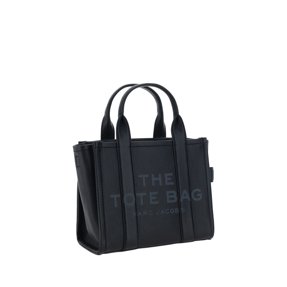 Marc Jacobs black calf leather Bos Taurus handbag with structured design and top handles.