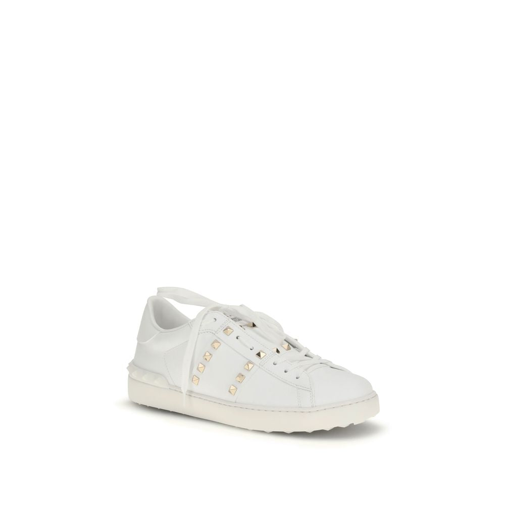 Valentino Garavani white calf leather Bos Taurus low top sneakers with sleek design and subtle branding details.