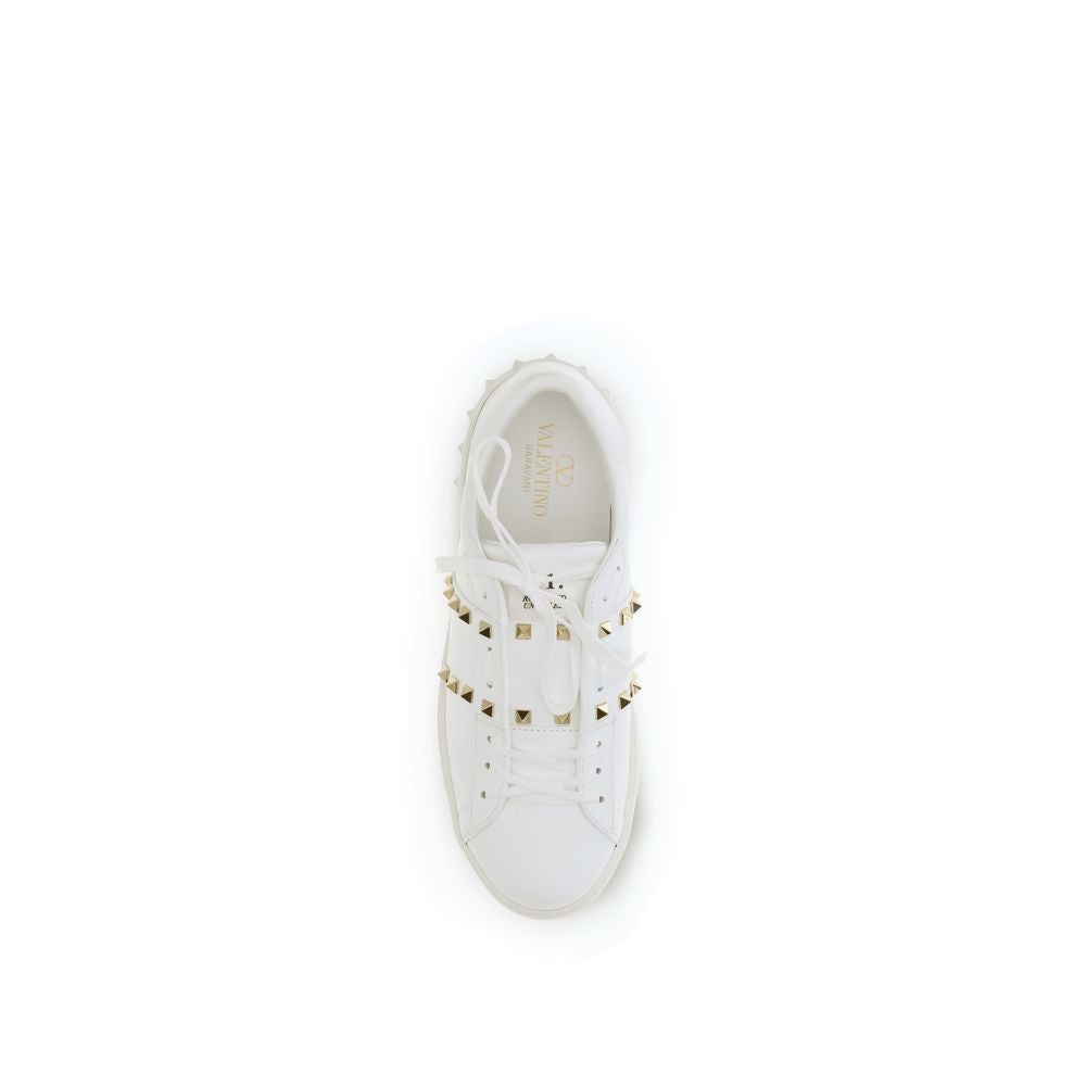 Valentino Garavani white calf leather Bos Taurus low top sneakers with sleek design and subtle branding.