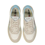 Autry white leather sneakers with classic design, featuring clean stitching and lace-up closure, on a plain background.