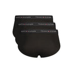 Black cotton men's briefs by Tommy Hilfiger featuring the brand logo waistband and comfortable fit.