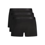 Black cotton men's boxer shorts by Hugo Boss, featuring a comfortable fit and classic design, shown on a plain background.