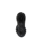 Balenciaga black polyethylene athletic sneakers with a sleek design and sporty silhouette.