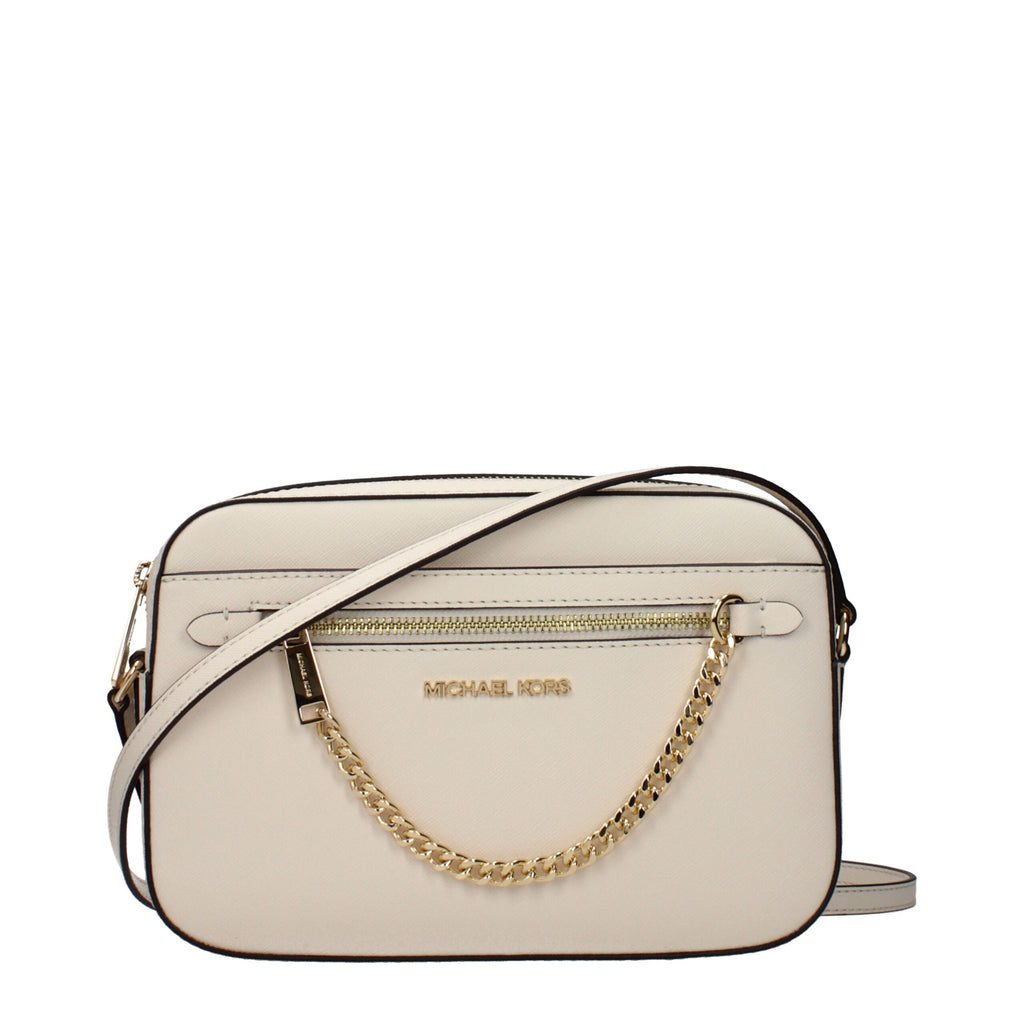 Michael Kors beige leather crossbody bag with adjustable strap and gold-tone hardware, featuring a sleek, minimalist design.