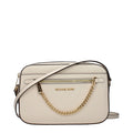 Michael Kors beige leather crossbody bag with adjustable strap and gold-tone hardware, featuring a sleek, minimalist design.