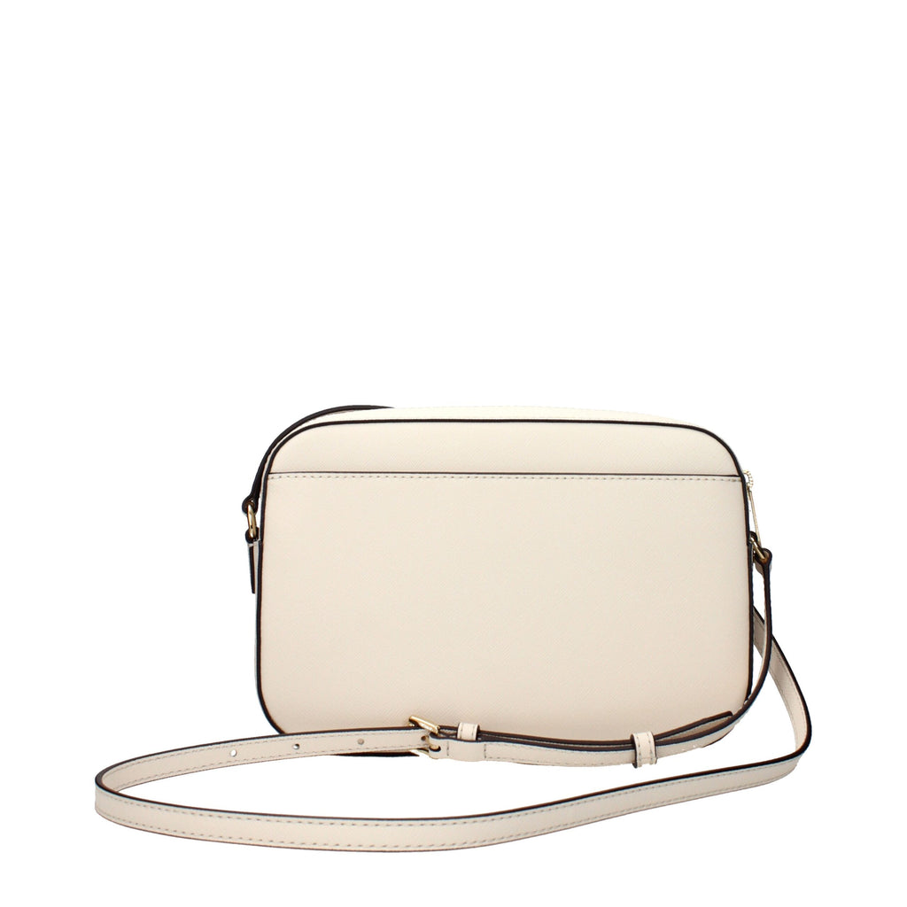 Michael Kors beige leather crossbody bag with adjustable strap and gold-tone hardware, stylish and versatile for everyday wear.