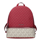 Michael Kors beige fabric backpack with adjustable straps, front zip pocket, and logo detail for casual everyday use.