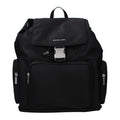 Black fabric Michael Kors backpack with adjustable straps, front zip pocket, and logo detail, designed for stylish everyday use.