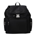 Black fabric Michael Kors backpack with adjustable straps, front zip pocket, and logo detail, designed for stylish everyday use.