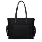 Black fabric shoulder bag by Michael Kors featuring a sleek design and adjustable strap, perfect for stylish everyday use.