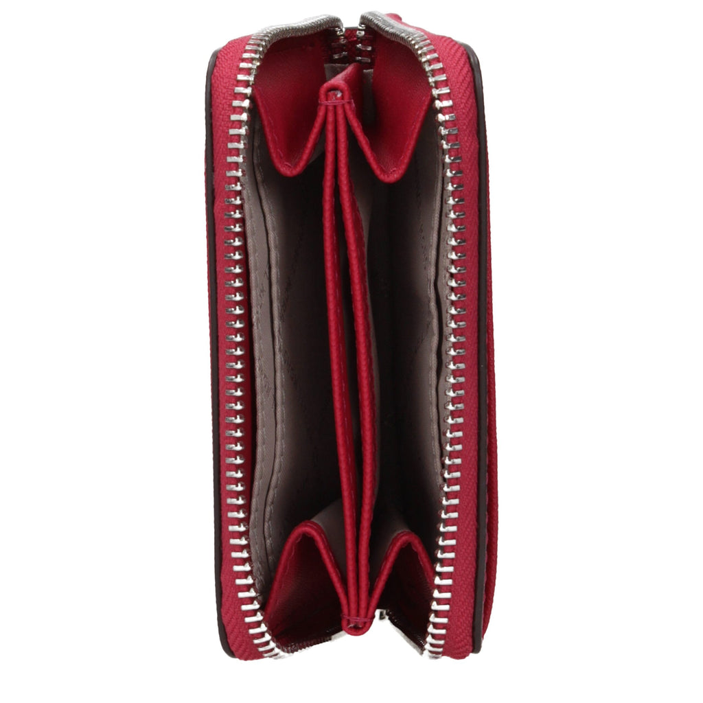 Michael Kors red leather cardholder with multiple card slots and sleek design.