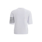 Thom Browne white cotton sportswear, casual athletic shirt with brand logo, laid flat on a neutral background.