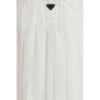 Prada white cotton long skirt with a flowing design, featuring a high waist and elegant style.