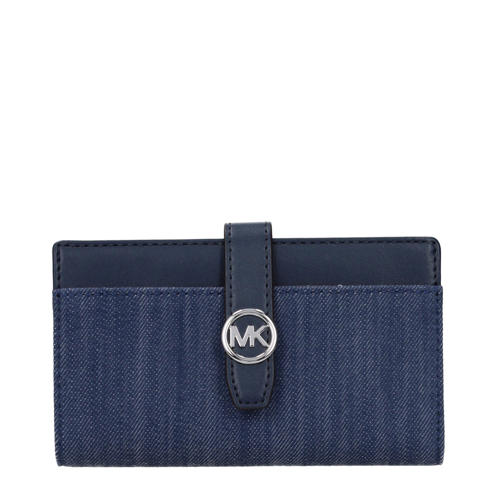 Blue fabric Michael Kors wallet with multiple card slots and a sleek, compact design for stylish everyday use.