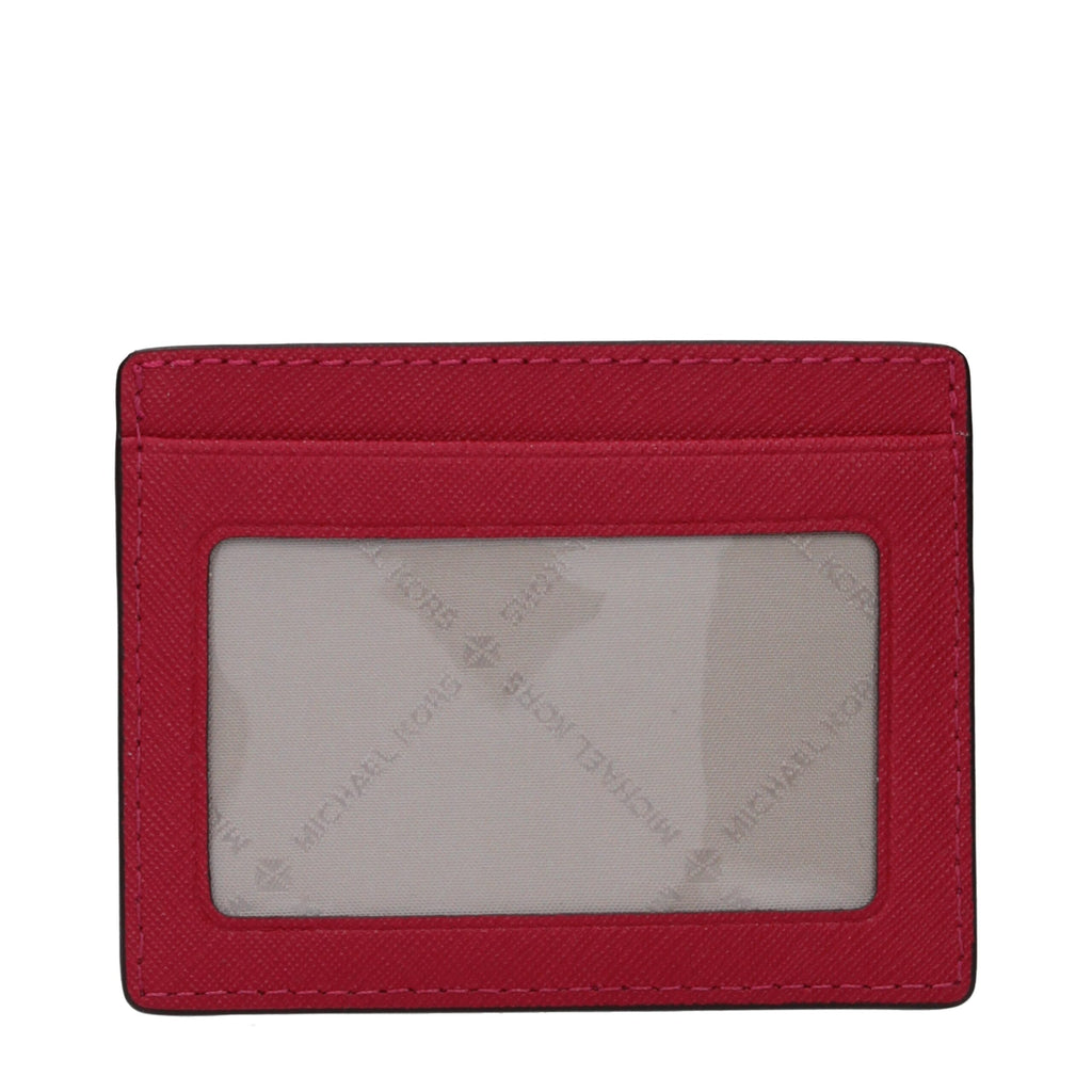 Michael Kors red leather cardholder with multiple card slots and sleek design.
