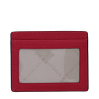 Michael Kors red leather cardholder with multiple card slots and sleek design.