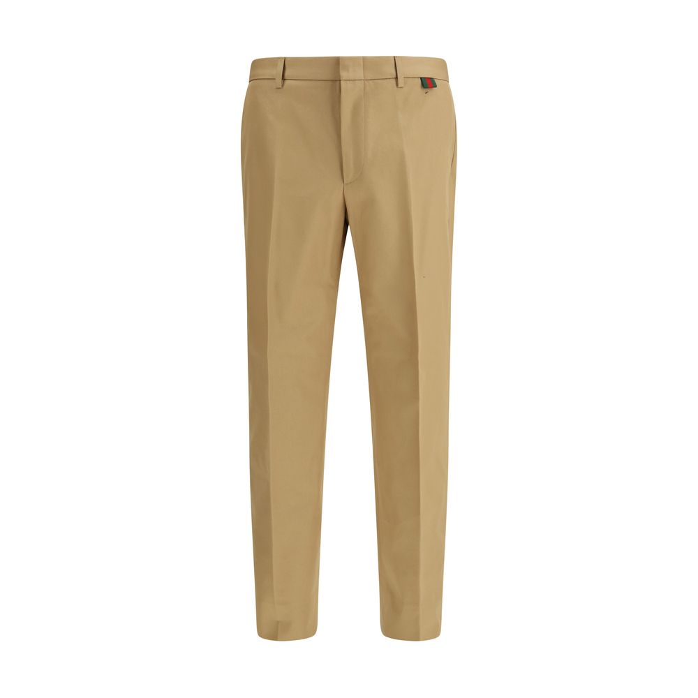 Beige Gucci cotton casual pants with a relaxed fit, featuring classic design and subtle branding details.