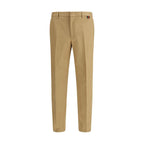 Beige Gucci cotton casual pants with a relaxed fit, featuring classic design and subtle branding details.